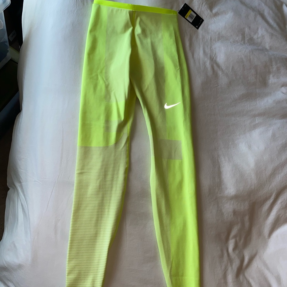 Nike tech running tights. Size S. Neon green